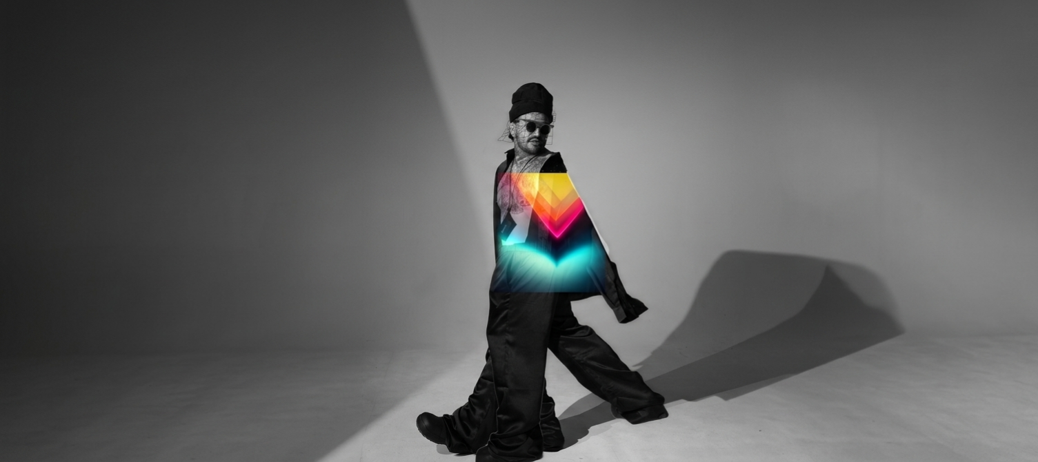 Glammy Lee in a monochrome editorial portrait with neon geometric color across the torso.